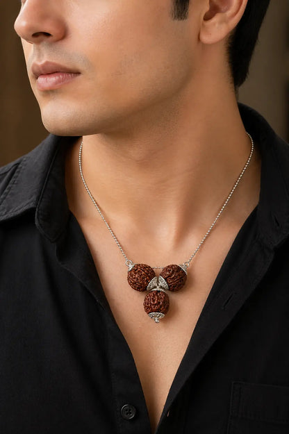 Professional wearing original Vyapar Vriddhi Rudraksha Kavach pendant for success and financial attraction - Tathastu Gems