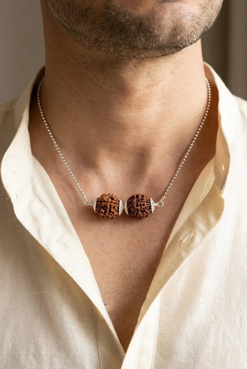 Person wearing original Sade Sati Kavach pendant for protection against Shani Dhaiya and negative energy - Tathastu Gems