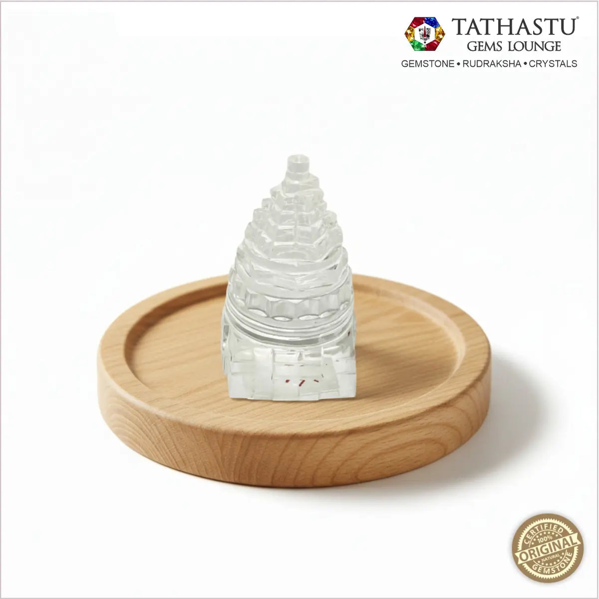 Original Sphatik Shree Yantra handcrafted from clear crystal quartz on wooden base - Tathastu Gems Lounge