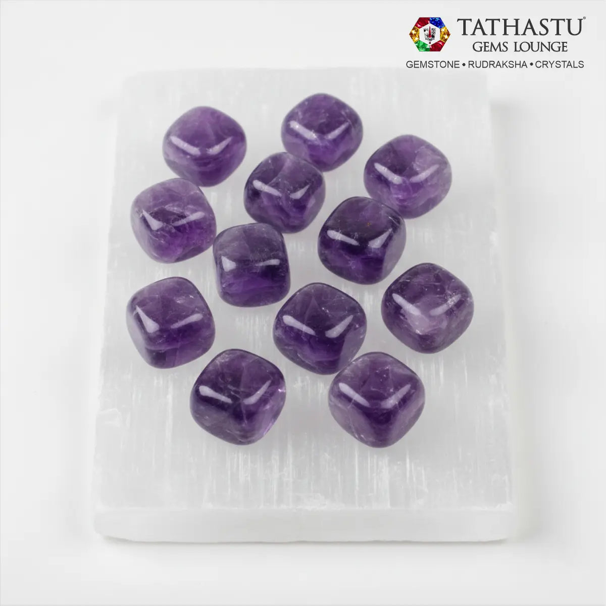 et of original Amethyst Tumble stones arranged in a grid for psychic protection, meditation, and anxiety relief - Tathastu Gems