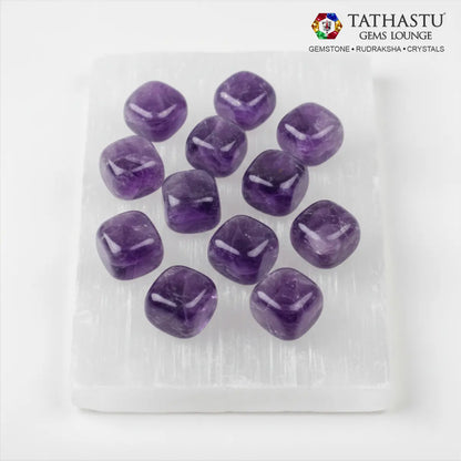 et of original Amethyst Tumble stones arranged in a grid for psychic protection, meditation, and anxiety relief - Tathastu Gems