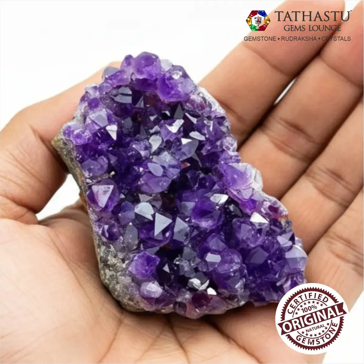 Unpolished natural Amethyst rough chunk held in palm showing authentic purple crystal texture and size - Tathastu Gems
