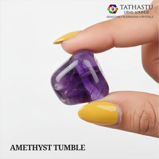 Natural polished Amethyst Tumble stone held in hand for inner peace, stress relief, and Third Eye Chakra healing - Tathastu Gems Lounge