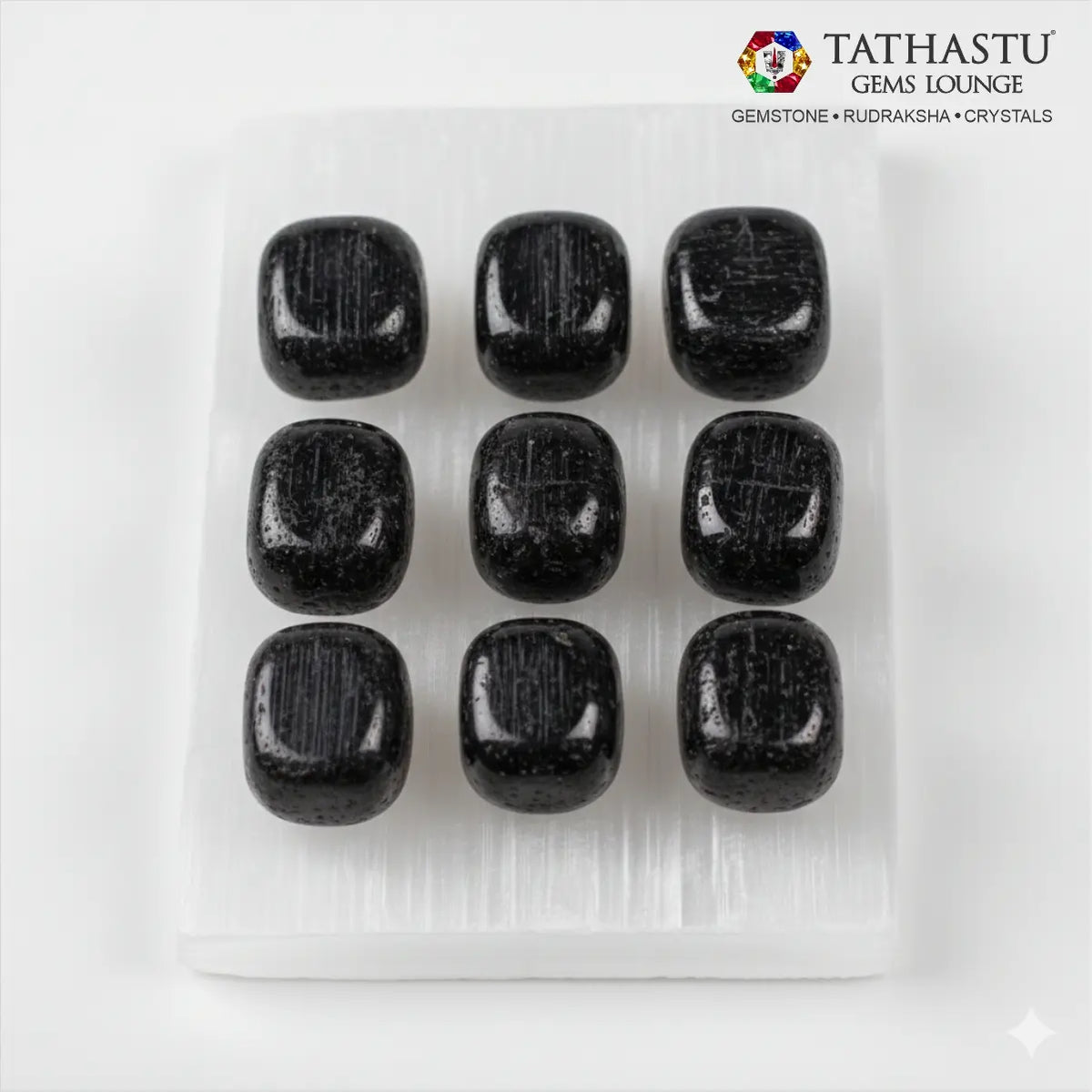 Set of original Black Tourmaline Tumble stones arranged in a grid for stability, EMF protection, and home Vastu balance - Tathastu Gems