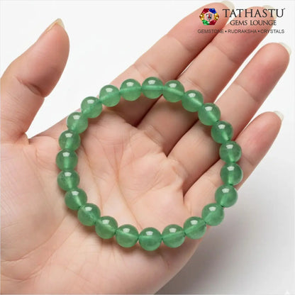 Authentic Original Green Aventurine Bracelet at Tathastu Gems Lounge held on an open palm displaying rich, natural green gemstone beads.