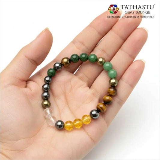 Authentic Original Dhanyog Bracelet at Tathastu Gems Lounge held on an open palm showing Green Aventurine, Tiger Eye, Citrine, and Pyrite beads.