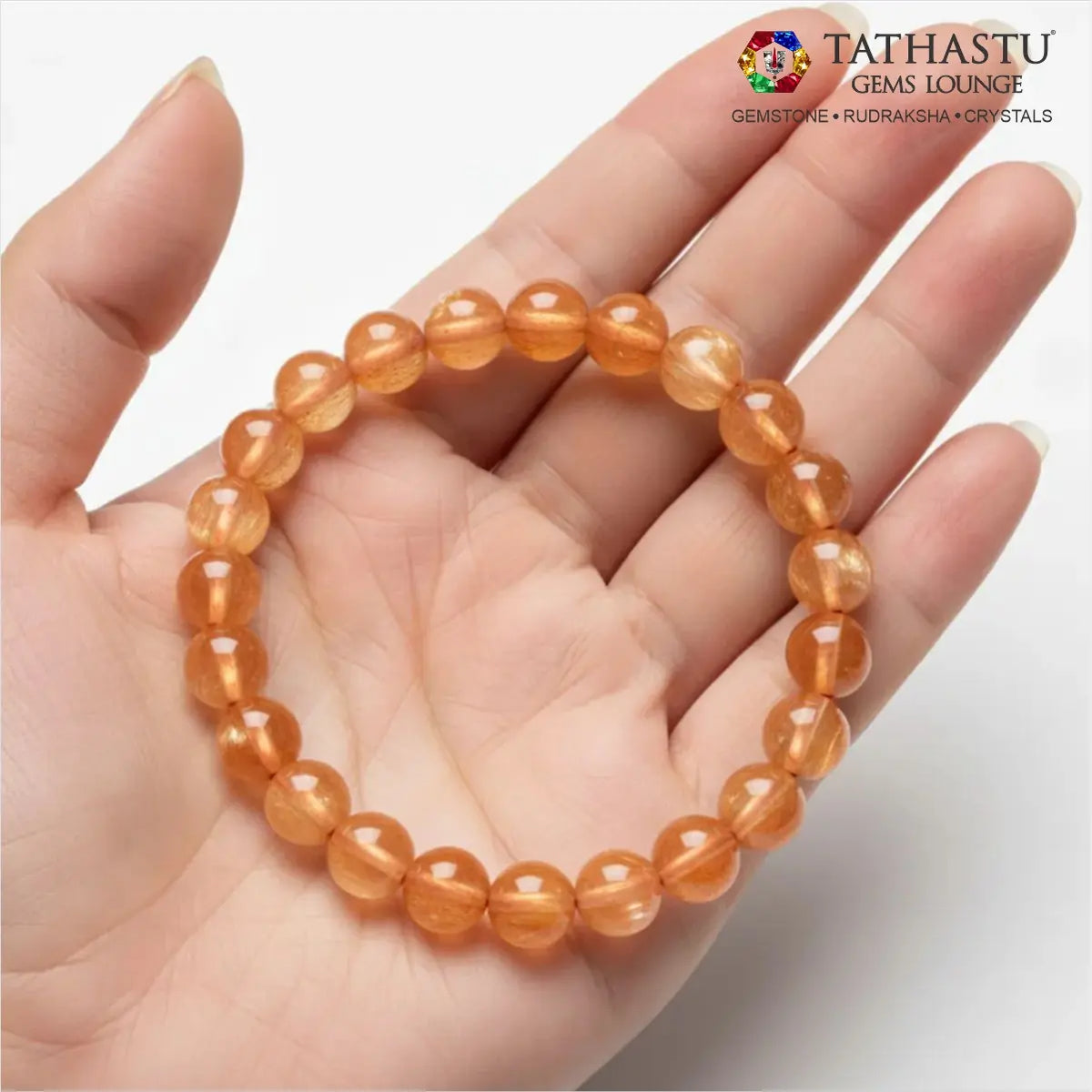 Authentic Original Sunstone Bracelet at Tathastu Gems Lounge held on an open palm displaying radiant sunstone beads with natural sparkle.
