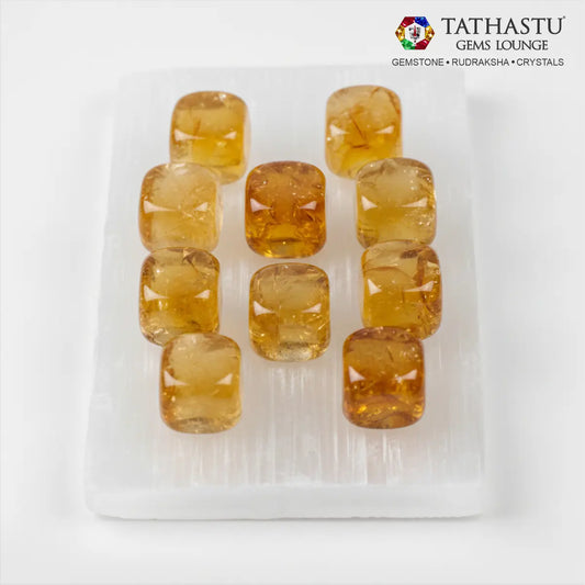 Set of original Citrine Tumble stones arranged in a grid for financial prosperity, success, and positive energy - Tathastu Gems