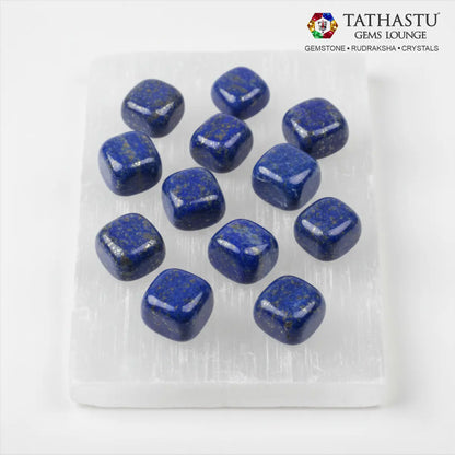 Set of original Lapis Lazuli Tumble stones arranged in a grid for spiritual growth, self-expression, and Third Eye healing - Tathastu Gems