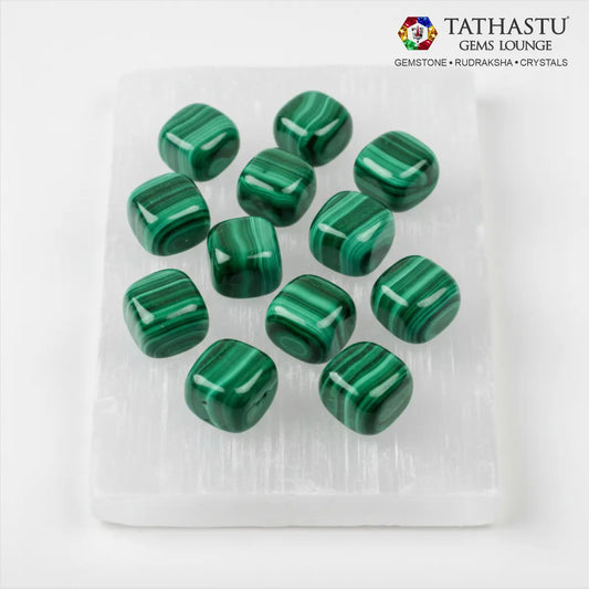 Set of original Malachite Tumble stones arranged in a grid for emotional healing, financial growth, and protection - Tathastu Gems