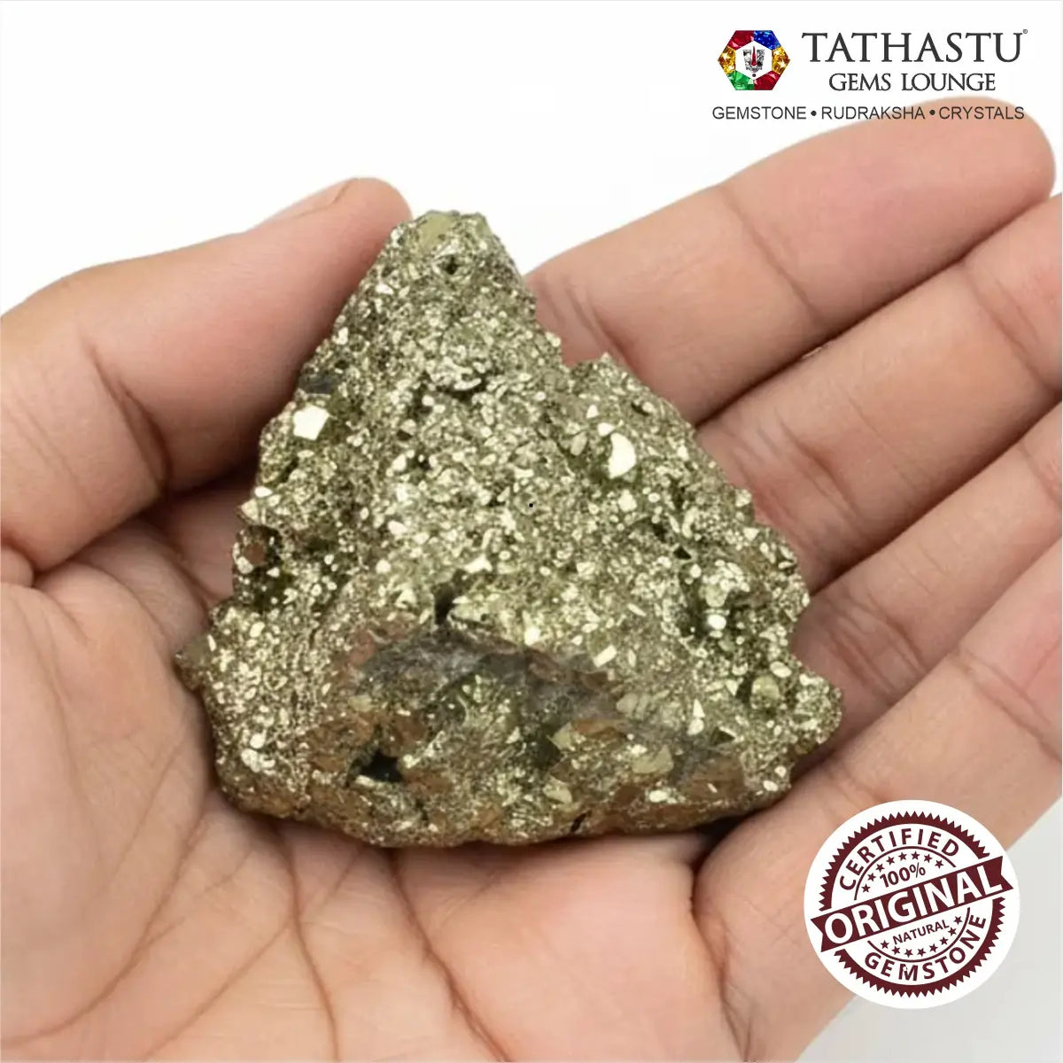 Unpolished natural Pyrite rough chunk held in palm showing metallic golden fool's gold crystal texture - Tathastu Gems