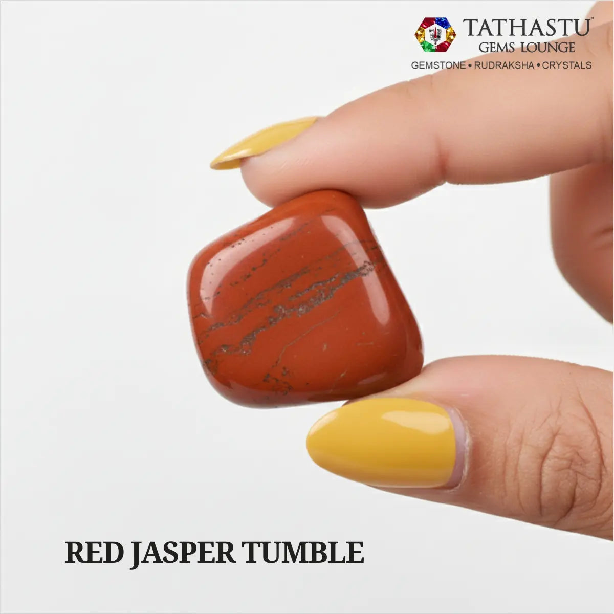 Natural polished Red Jasper Tumble stone held in hand for courage, emotional stability, and Root Chakra grounding - Tathastu Gems Lounge