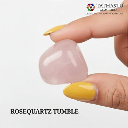 Natural polished Rose Quartz Tumble stone held in hand for attracting love, emotional healing, and Heart Chakra balance - Tathastu Gems Lounge