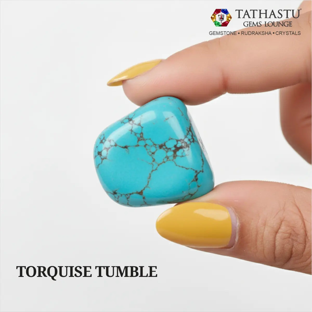 Natural polished Turquoise Tumble stone held in hand for good luck, spiritual protection, and Throat Chakra balancing - Tathastu Gems Lounge